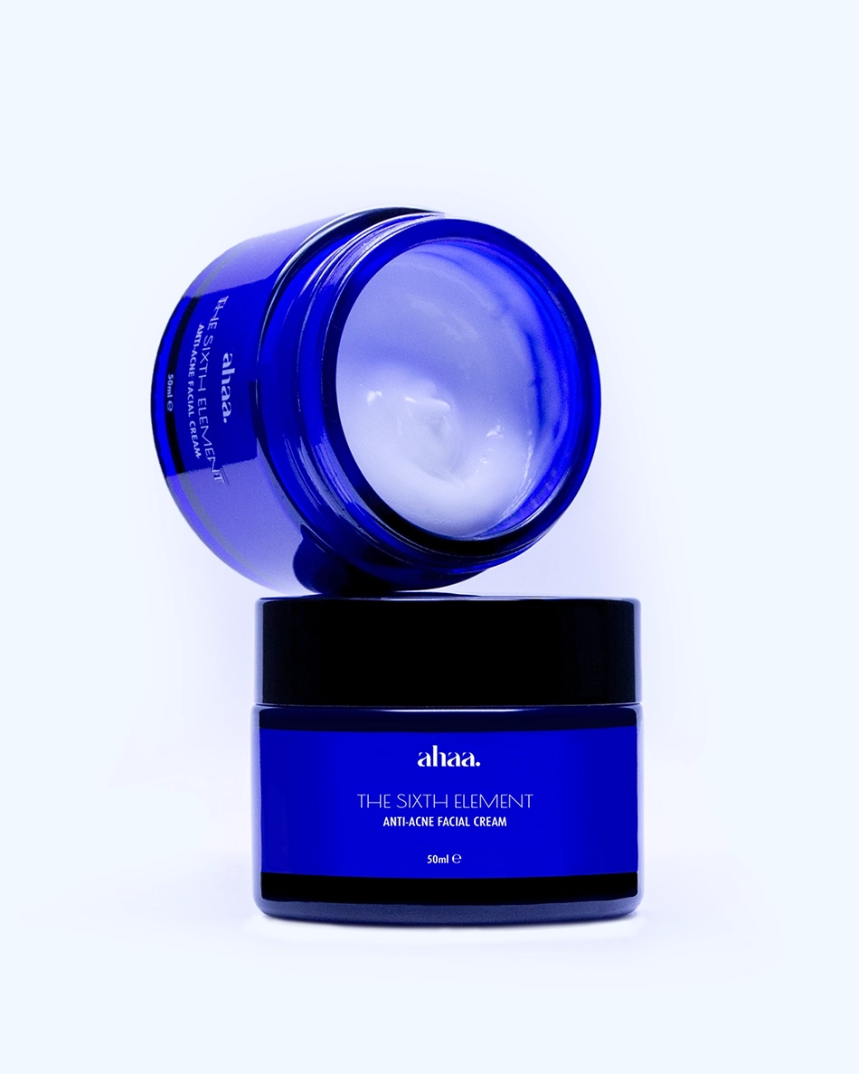 A picture showing two glass jars of The 6th Element - the anti acne face cream by Ahaa Skincare